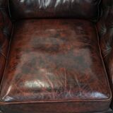 Set of two marbled cowhide leather Chesterfield armchairs in English style