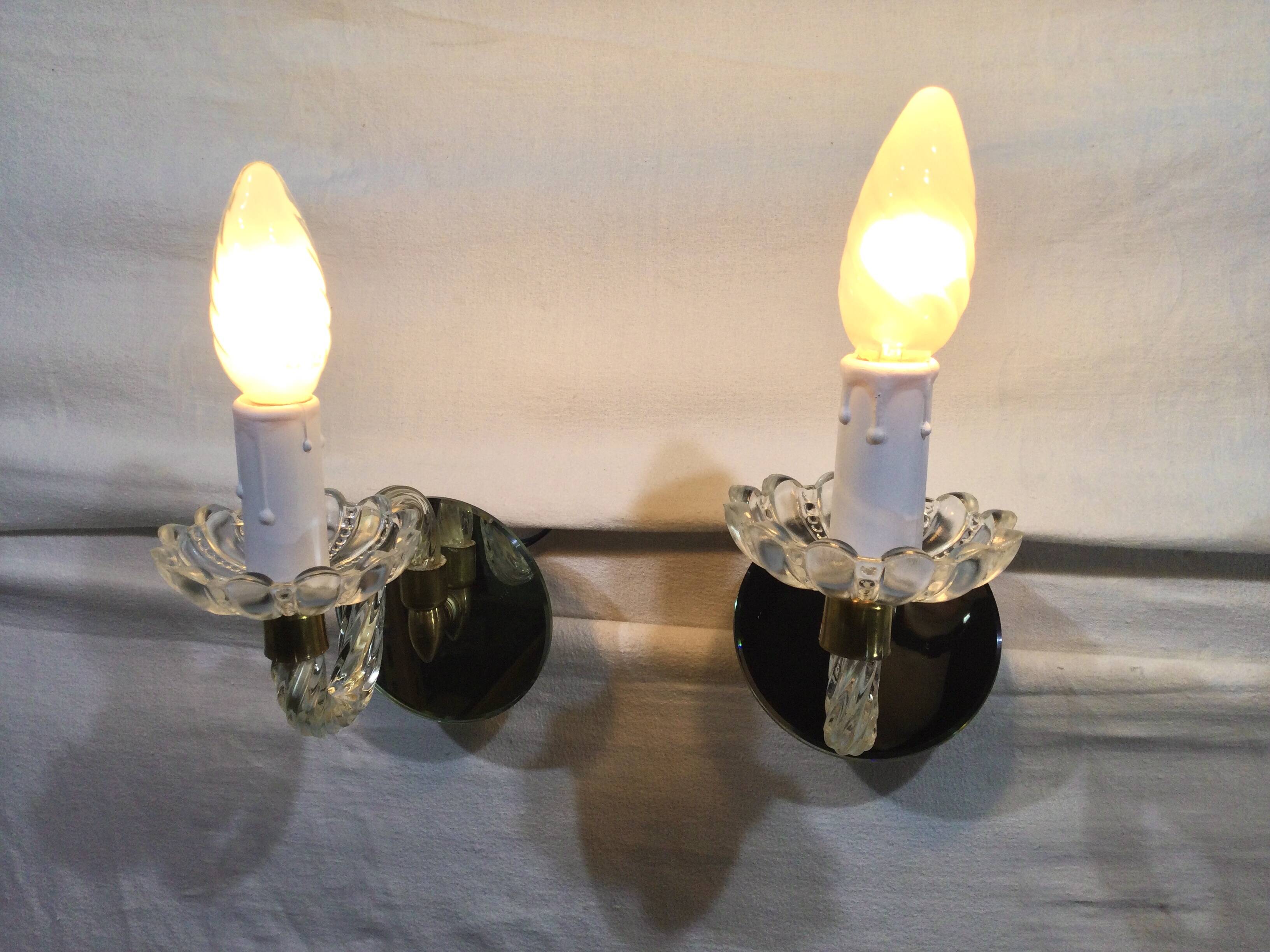 Pair of glass and mirror sconces