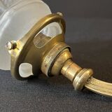 20th century Louis XVI style swan neck wall light in arabesque bronze and pleated glass tulip.