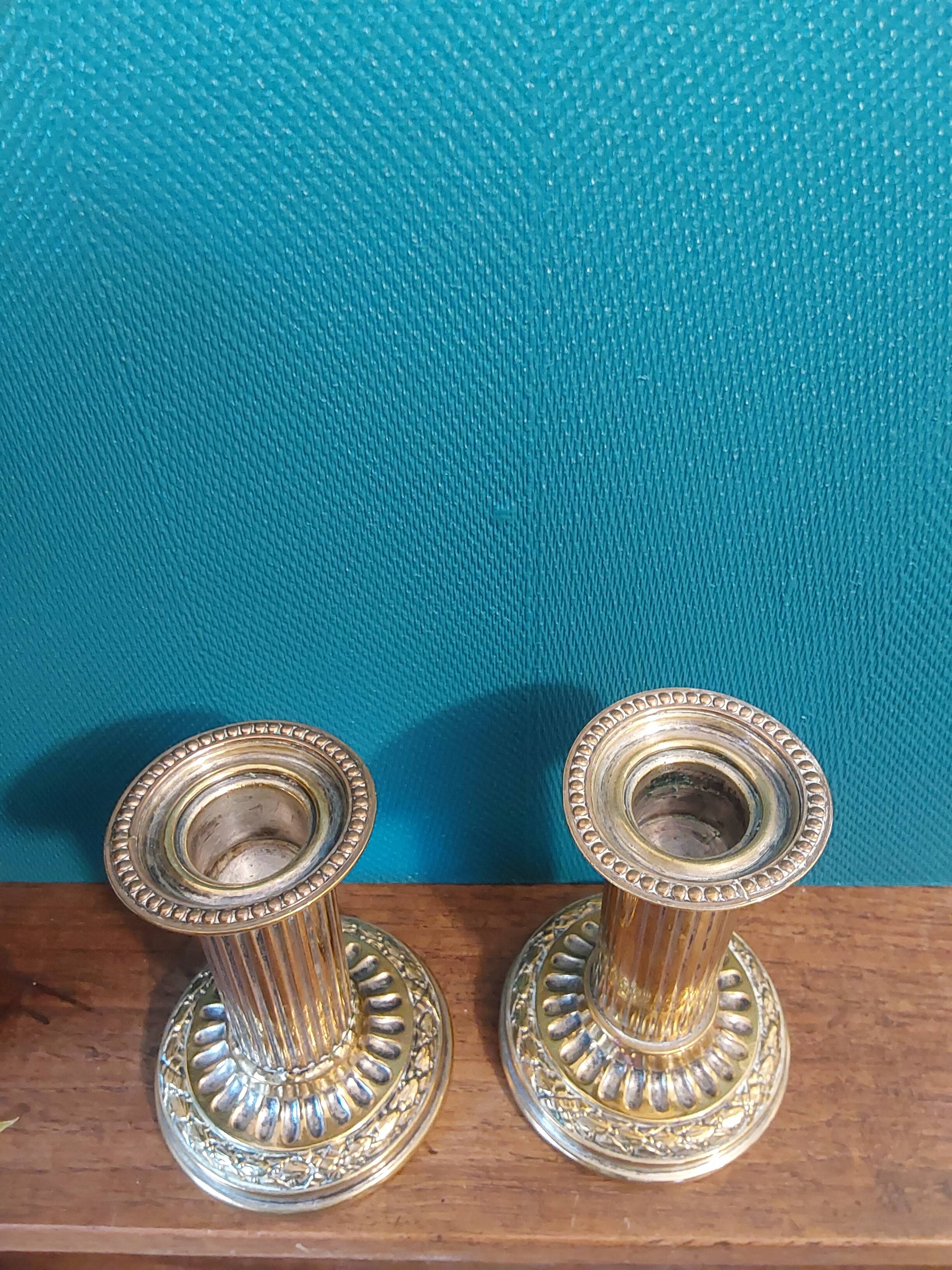 Louis XVI style brass candle holders