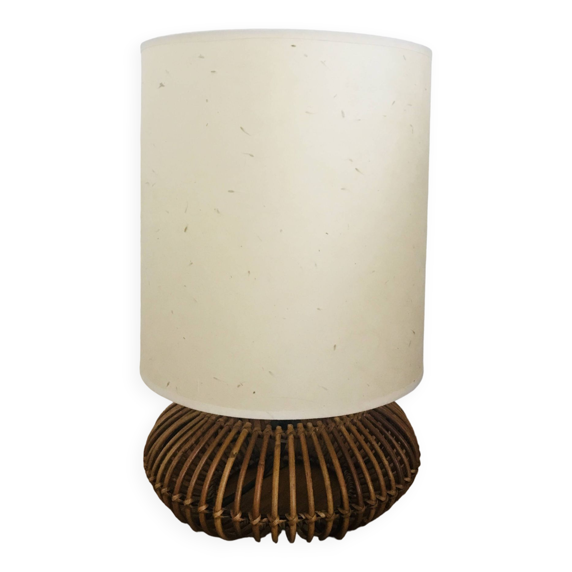 Table lamp with rattan base and papier-mâché hat