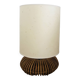 Table lamp with rattan base and papier-mâché hat