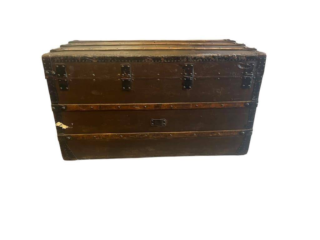 Vintage wooden coffee table with iron fittings.