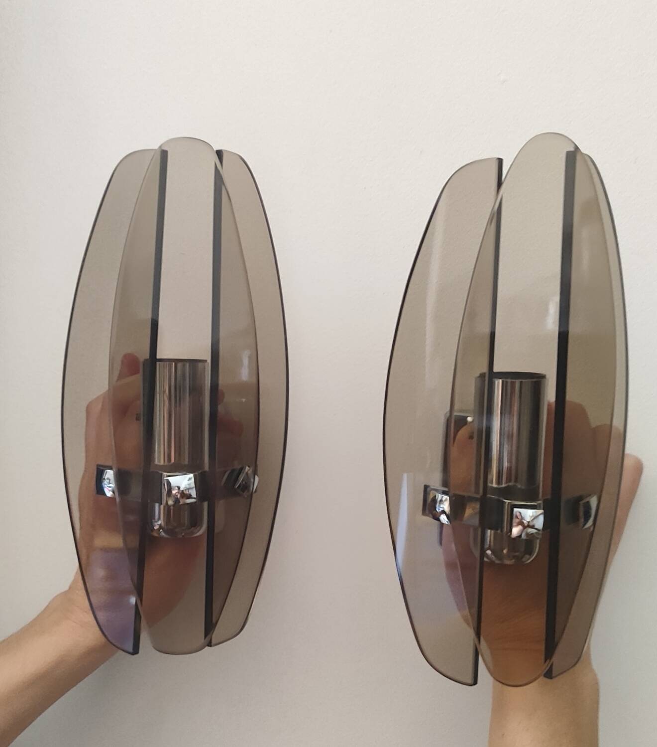 Two vintage smoked glass wall lights