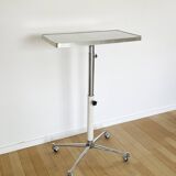 Tablet with chrome and white lacquered wheels