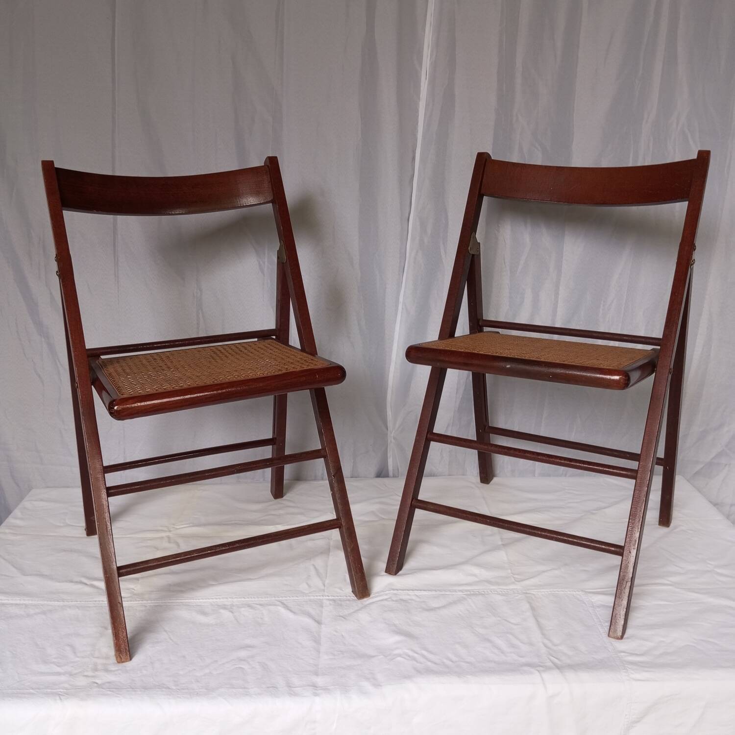 Folding wooden and cane chairs