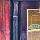 Mahogany display case with gilded brass decoration