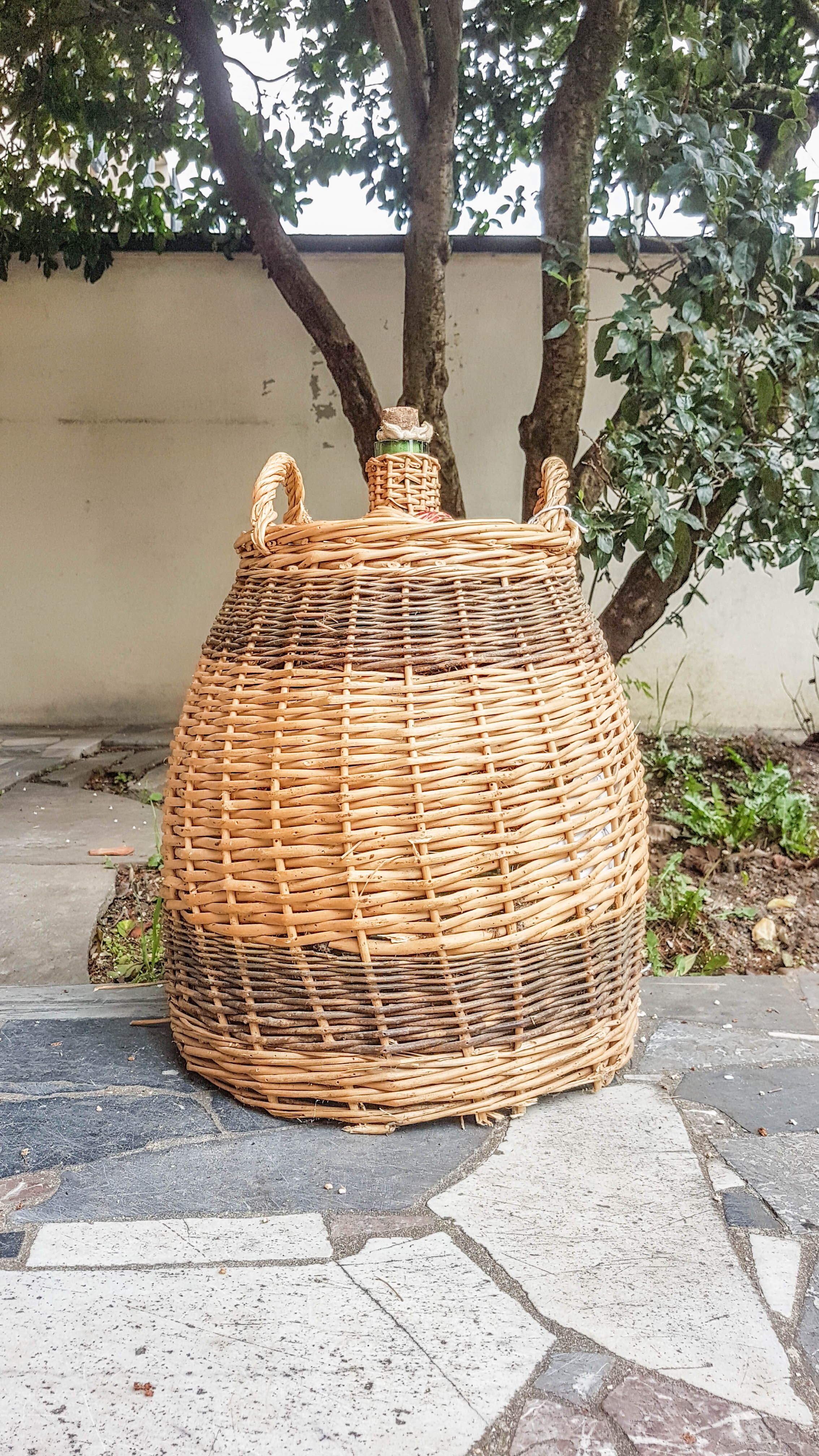 Demijohn covered with wicker