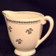 Antique milk jug in Gien earthenware, Valence model A040.