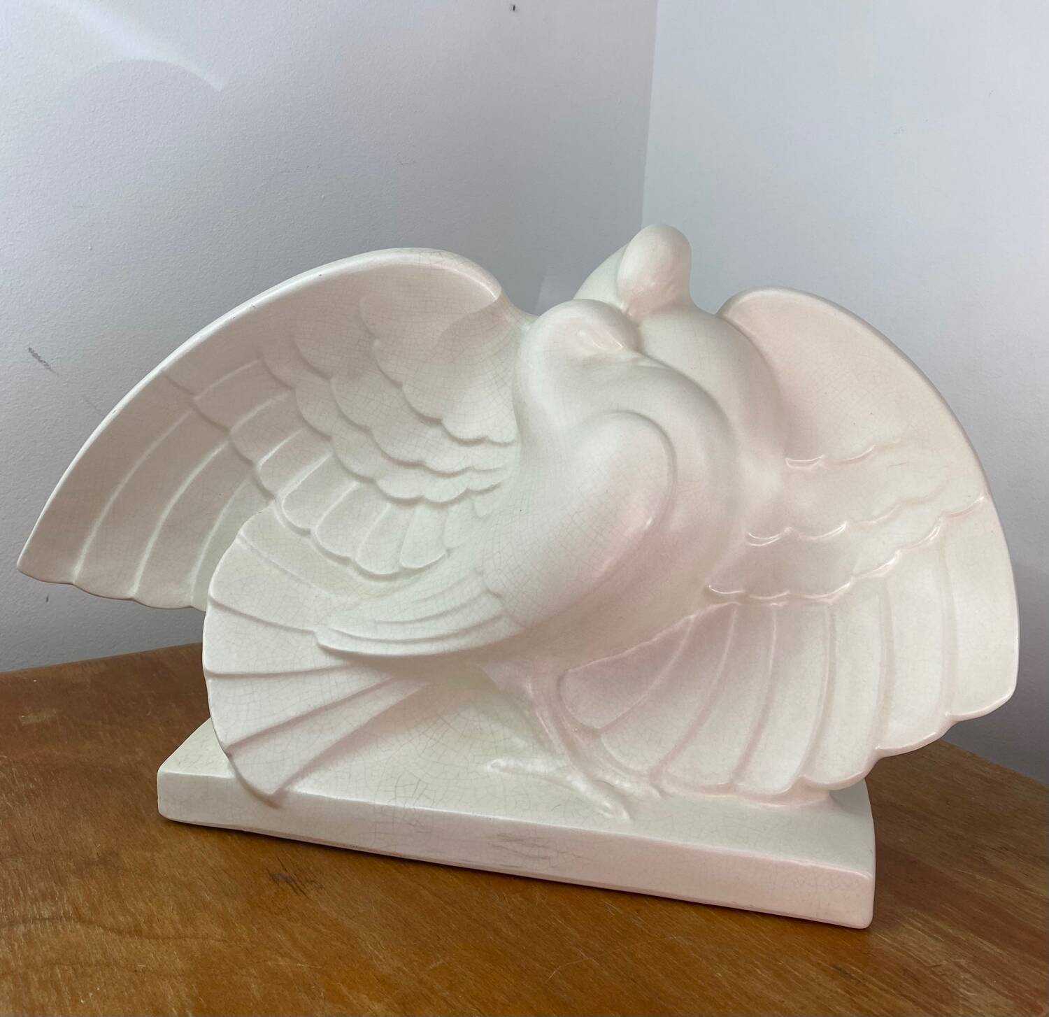 Cracked ceramic doves, signed Lejan