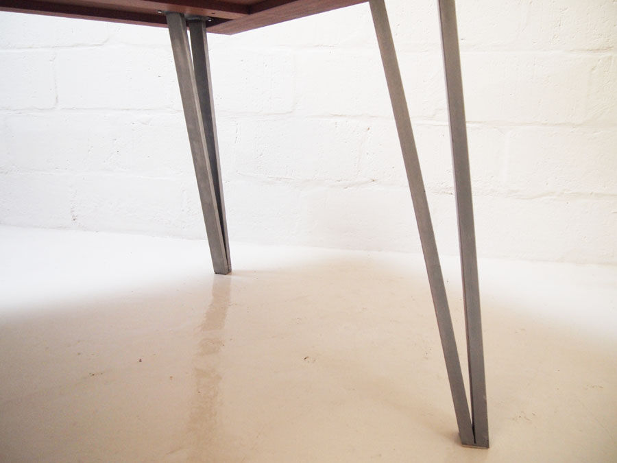 Midcentury danish rosewood dining table on bare steel box pin legs