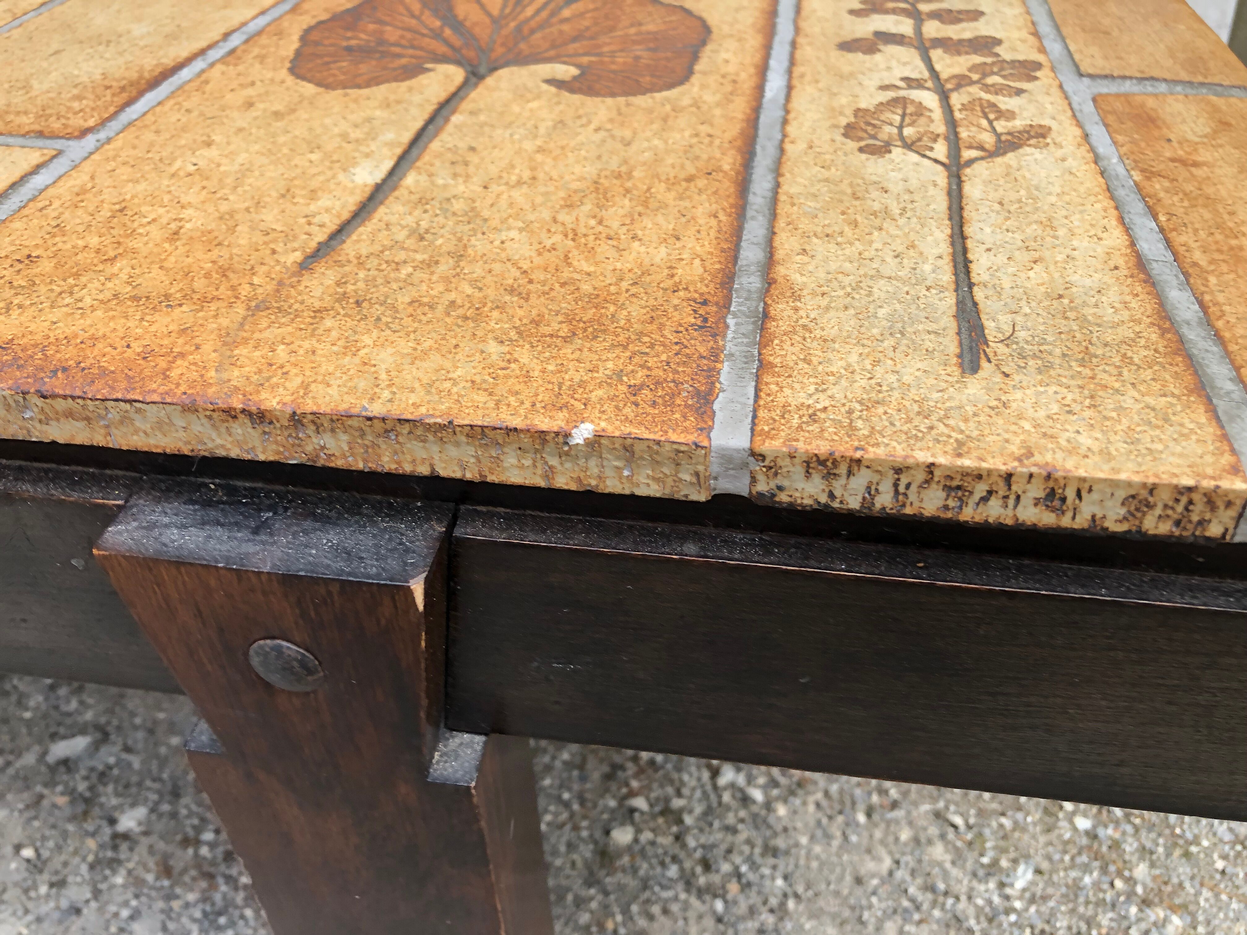 Vintage ceramic coffee table with herbarium decorations by Roger Capron, solid beech base.