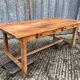 Vendée farmhouse table with cat bar and 2 drawers in solid cherry wood.