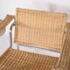 Pair of wicker and chrome armchairs