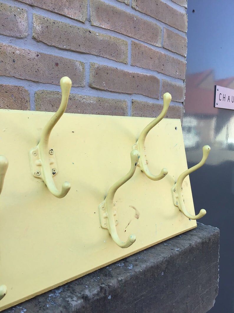 Industrial wall coat holder