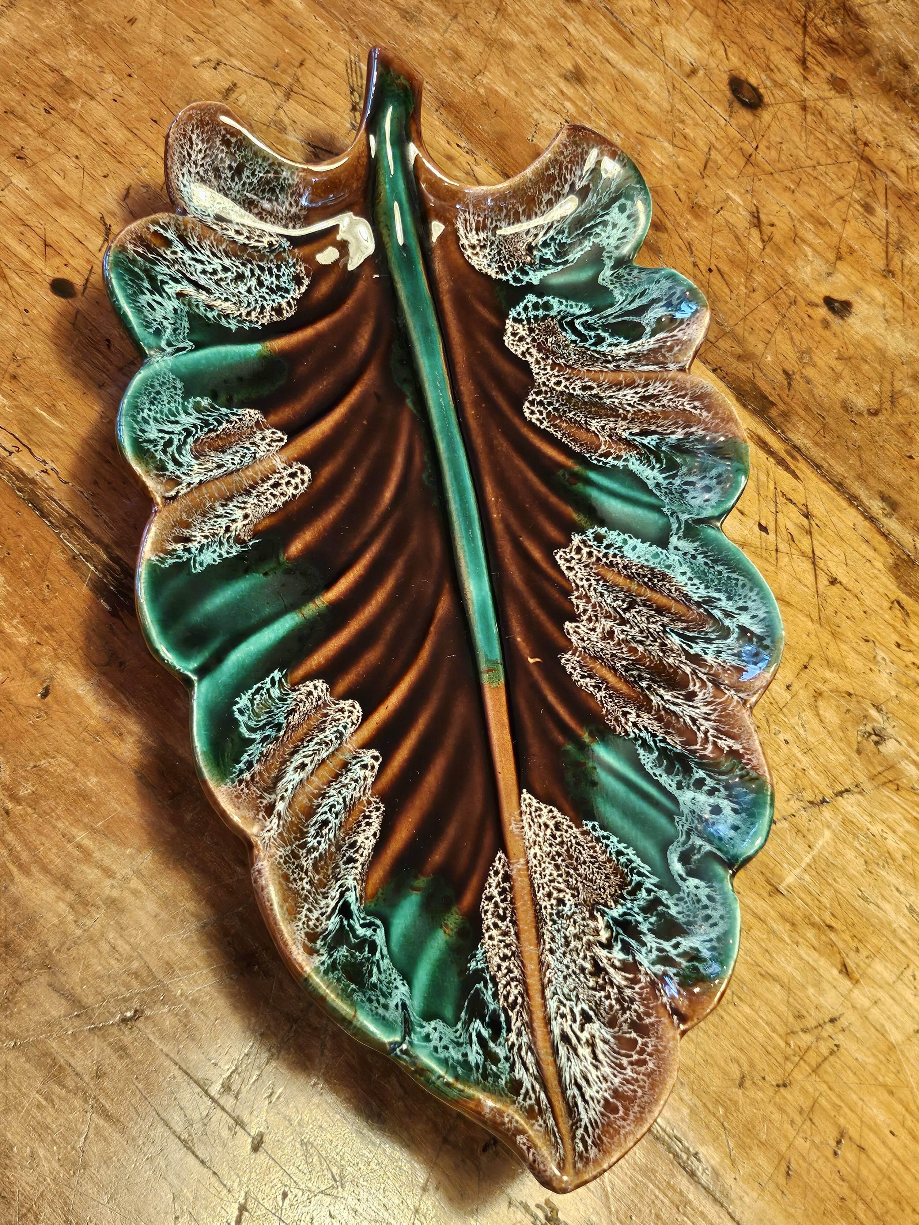 Set of 2 leaf-shaped ceramic dishes from Vallauris.