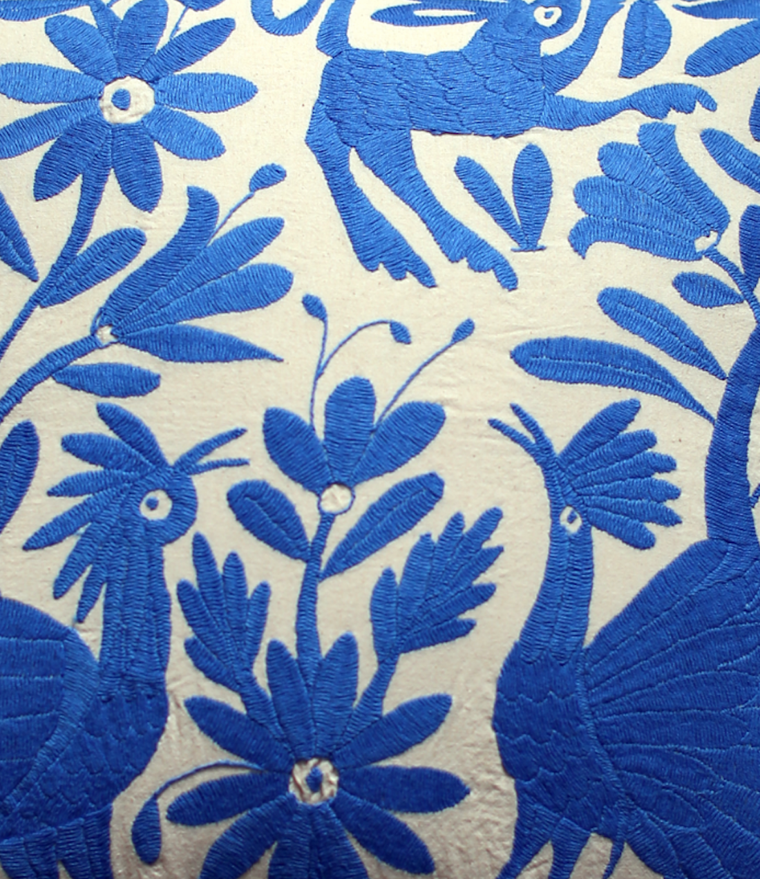 Blue hand embroidered cushion