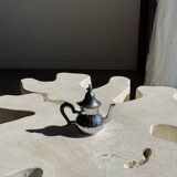 Silver-plated teapot with black handle