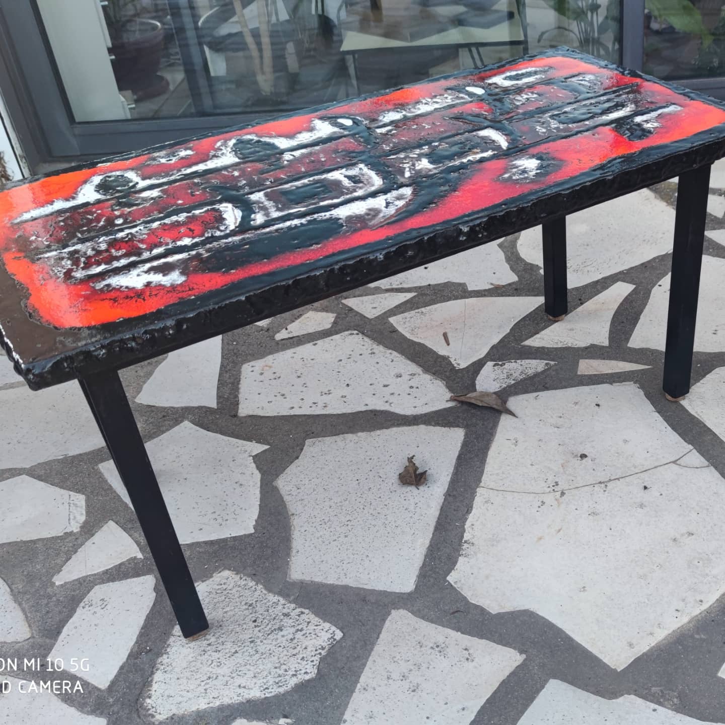 Ceramic coffee table on a lava stone slab, circa 1950