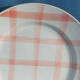 Round/flat serving dish, Moulin des Loups Orchies décor Scottish tiles orange