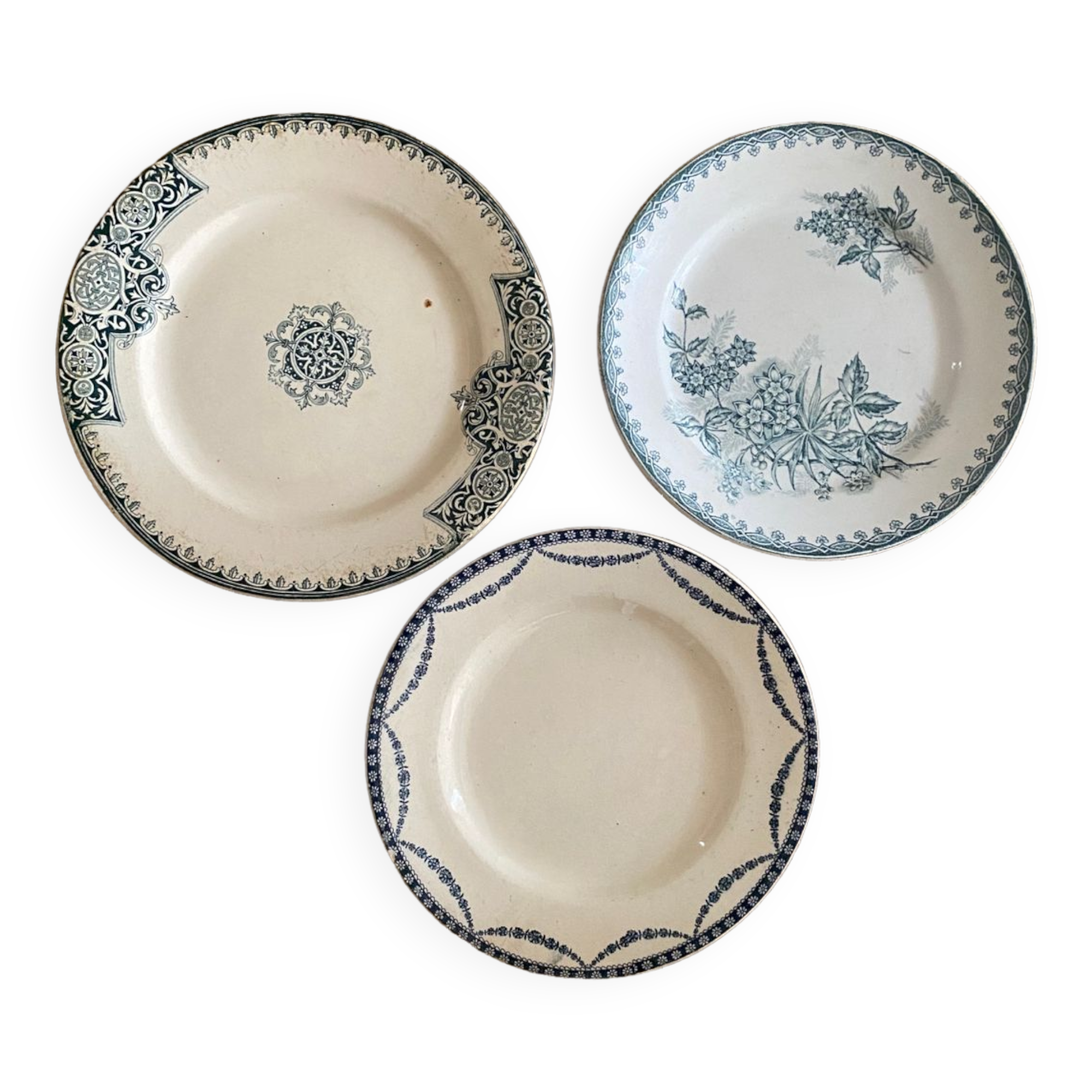 3 mismatched iron earth flat plates in green.