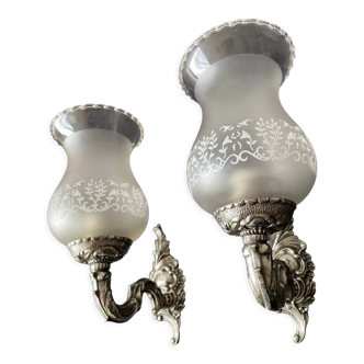 Pair of frosted glass globe wall lights from the early 20th century