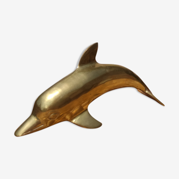 Golden vintage brass dolphin