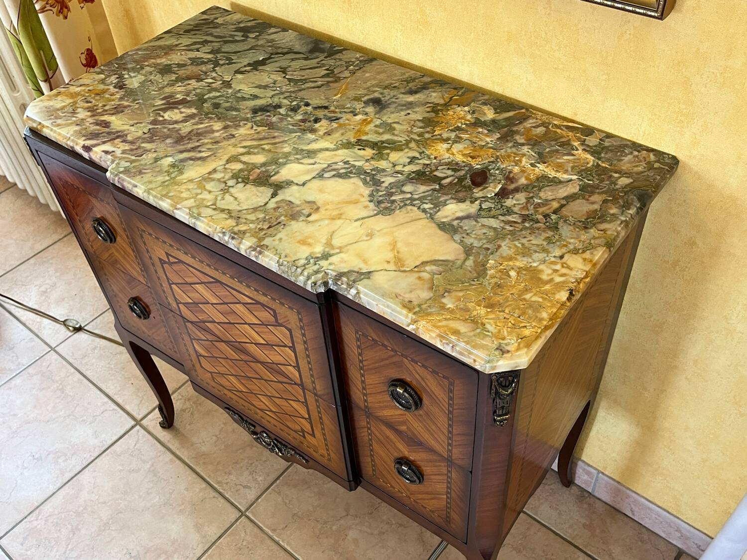 Small piece of furniture with marble top