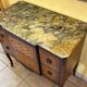 Small piece of furniture with marble top