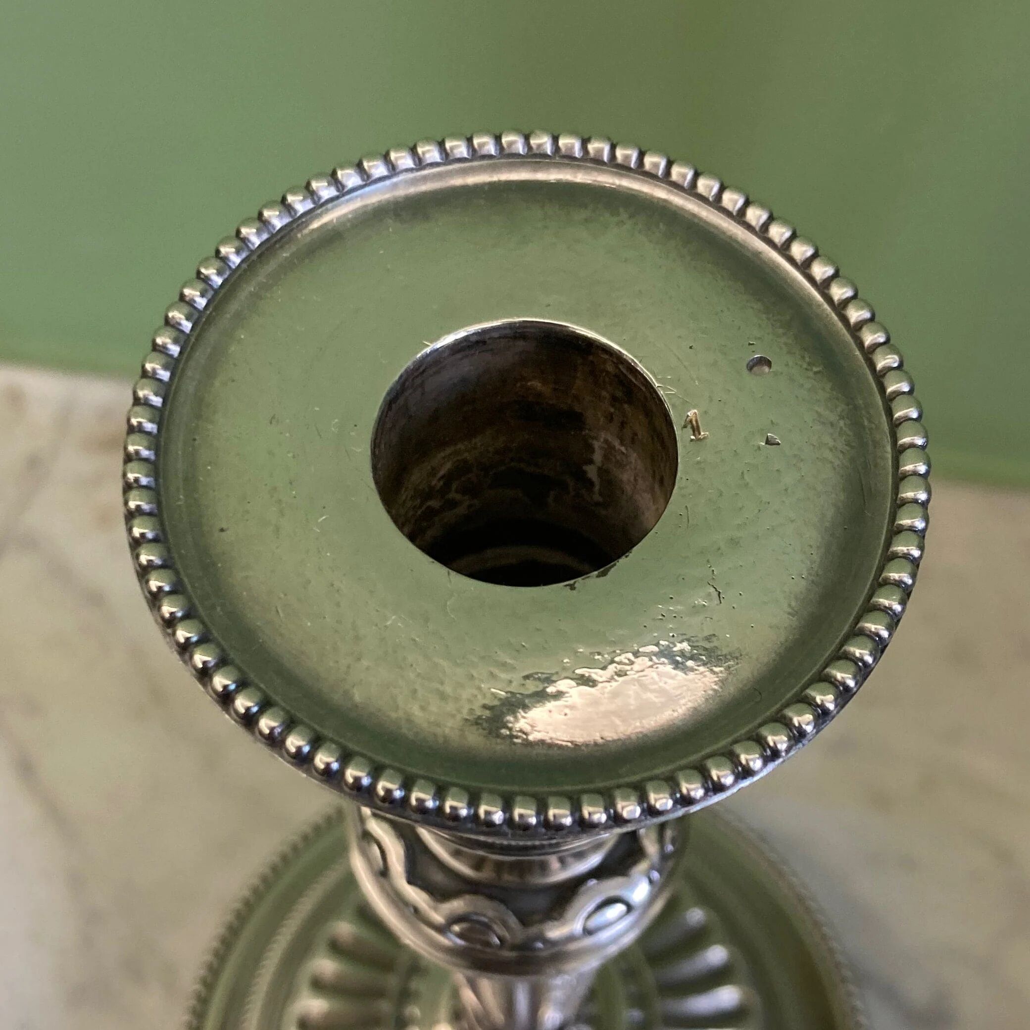 Pair of silvered bronze candlesticks from the 19th century in Louis XVI style signed Voisenet.