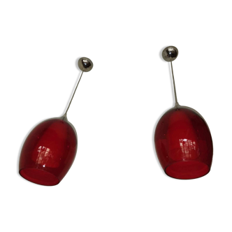 Pair of conical pendant lights in red tinted glass