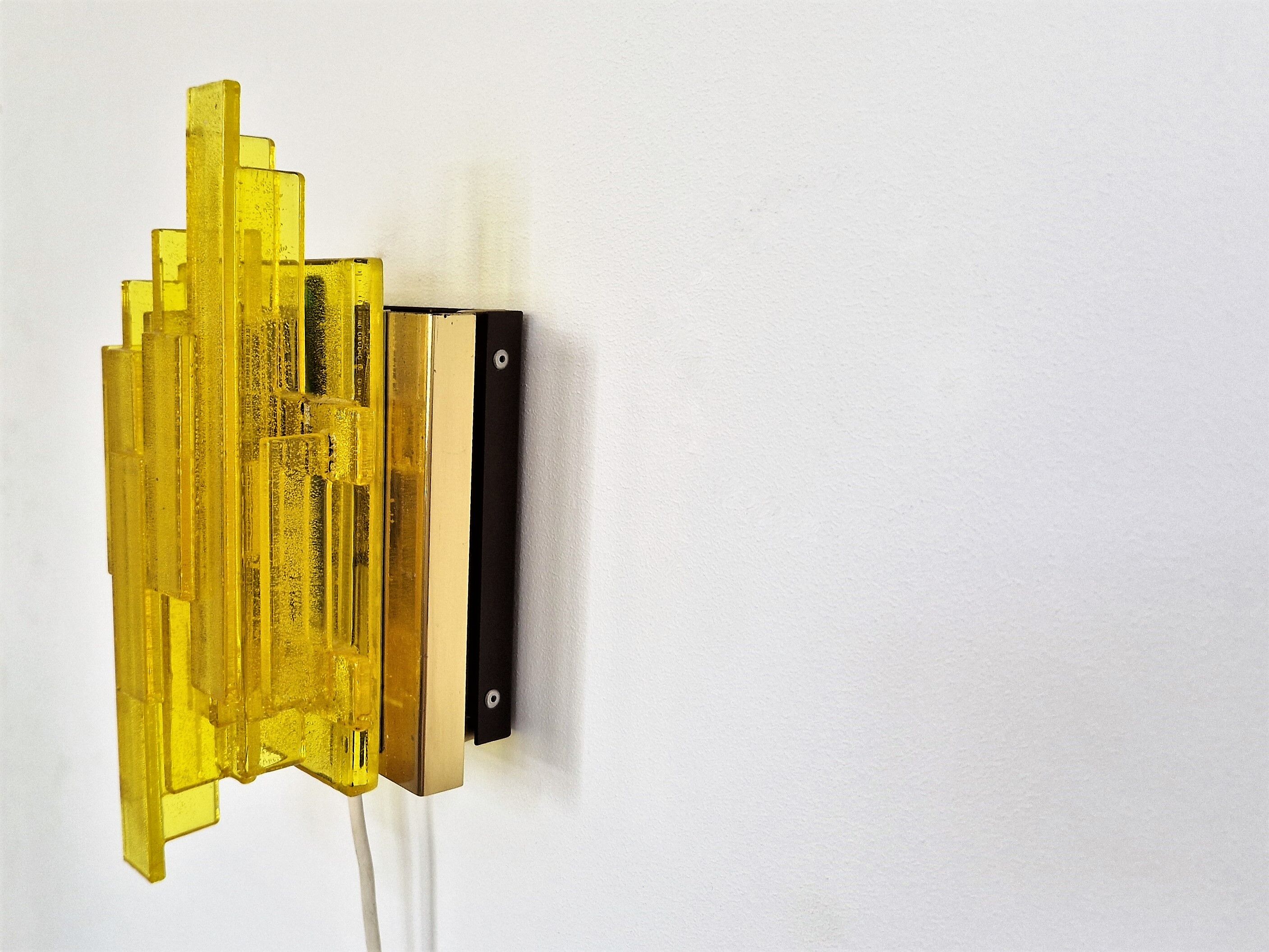 Yellow acrylic and metal wall lamp by Claus Bolby for Cebo Industri, Denmark 1960's