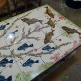 Ceramic coffee table with fish patterns