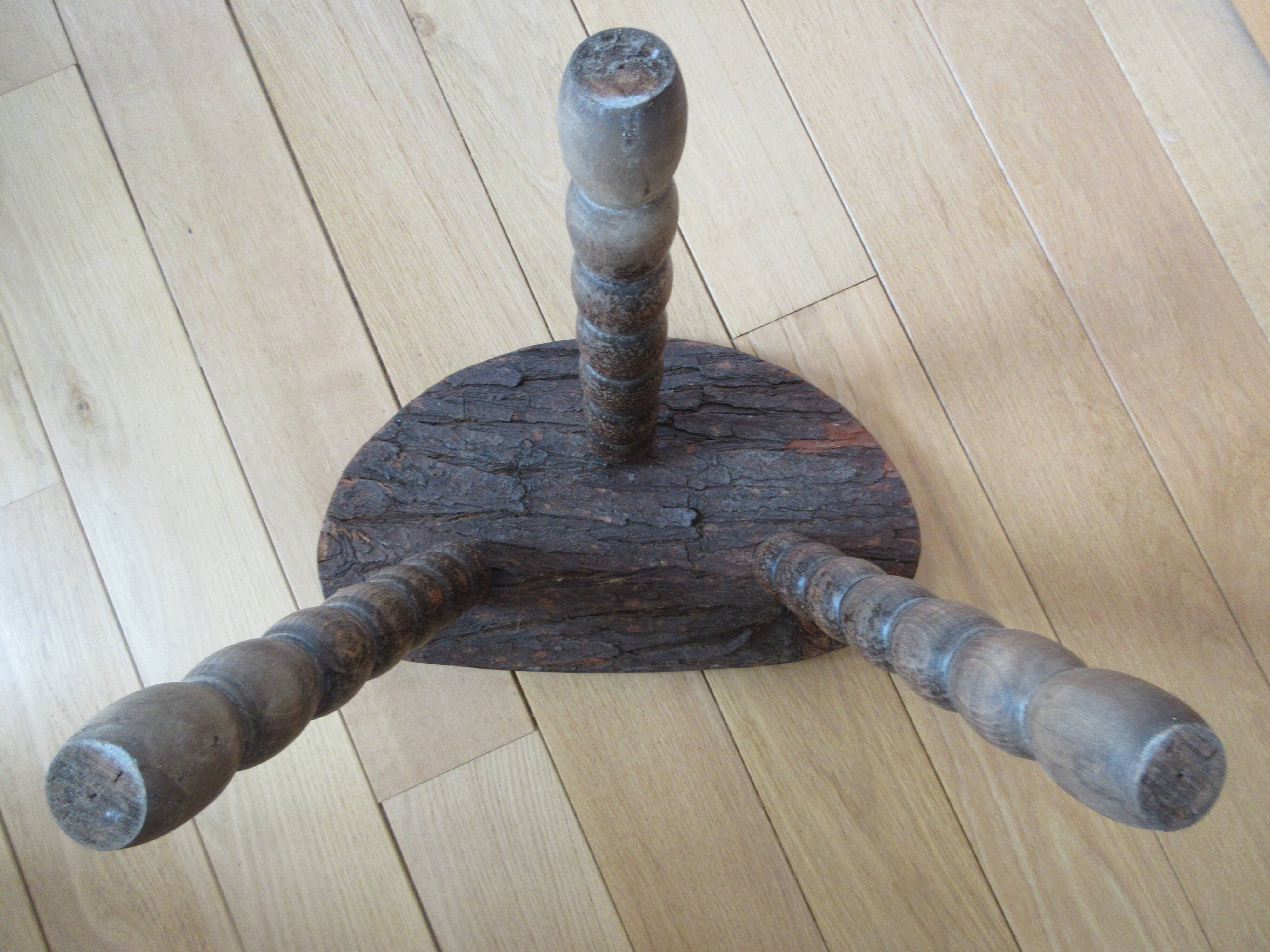 Brutalist-style wooden tripod