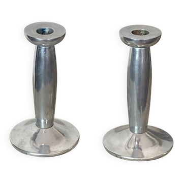 Pair of minimalist polished aluminium candle holders
