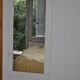Miroir mural rectangulaire blanc encadrement bois peint et verre, années 1980, 59x119 cm
