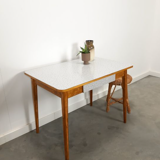 Vintage wooden dining table with formica top