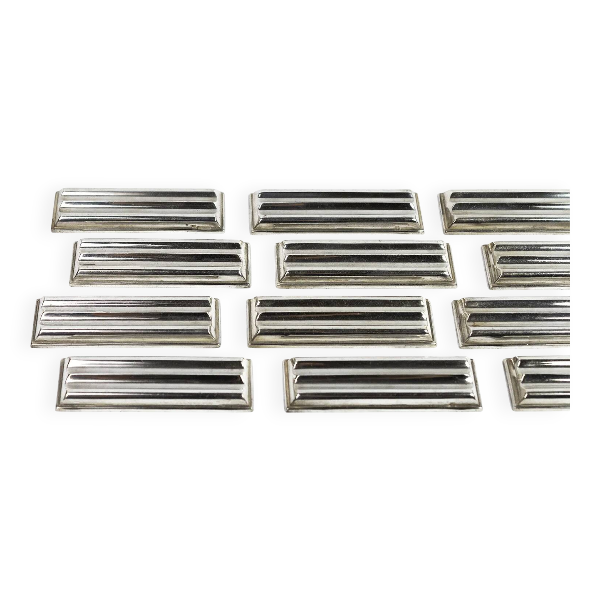Christofle — 12 “Ondulations” knife rests by Luc Lanel, silver-plated metal