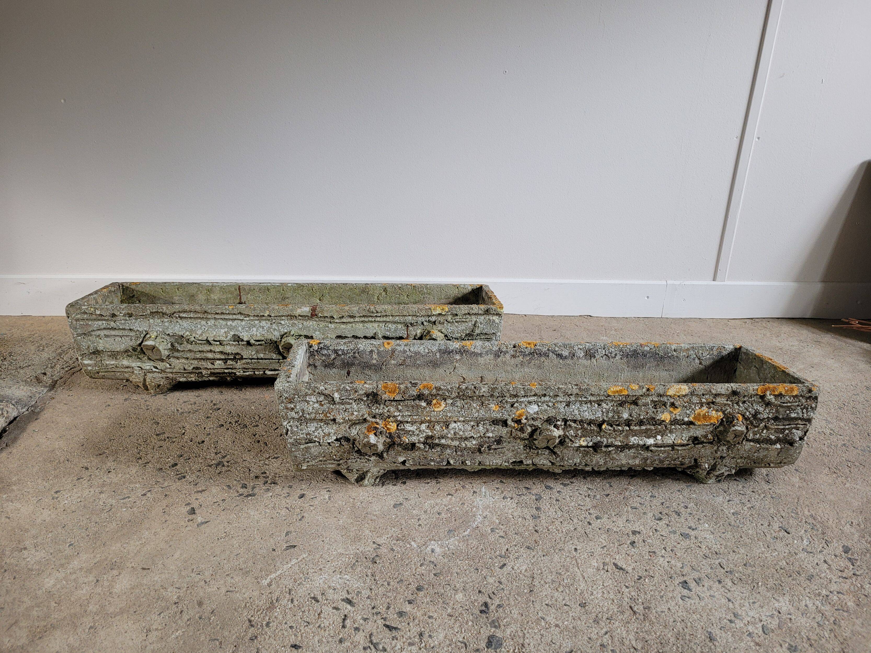 Old planters in faux cement wood