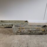 Old planters in faux cement wood