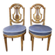 Paire de chaises style Louis XVI en bois doré