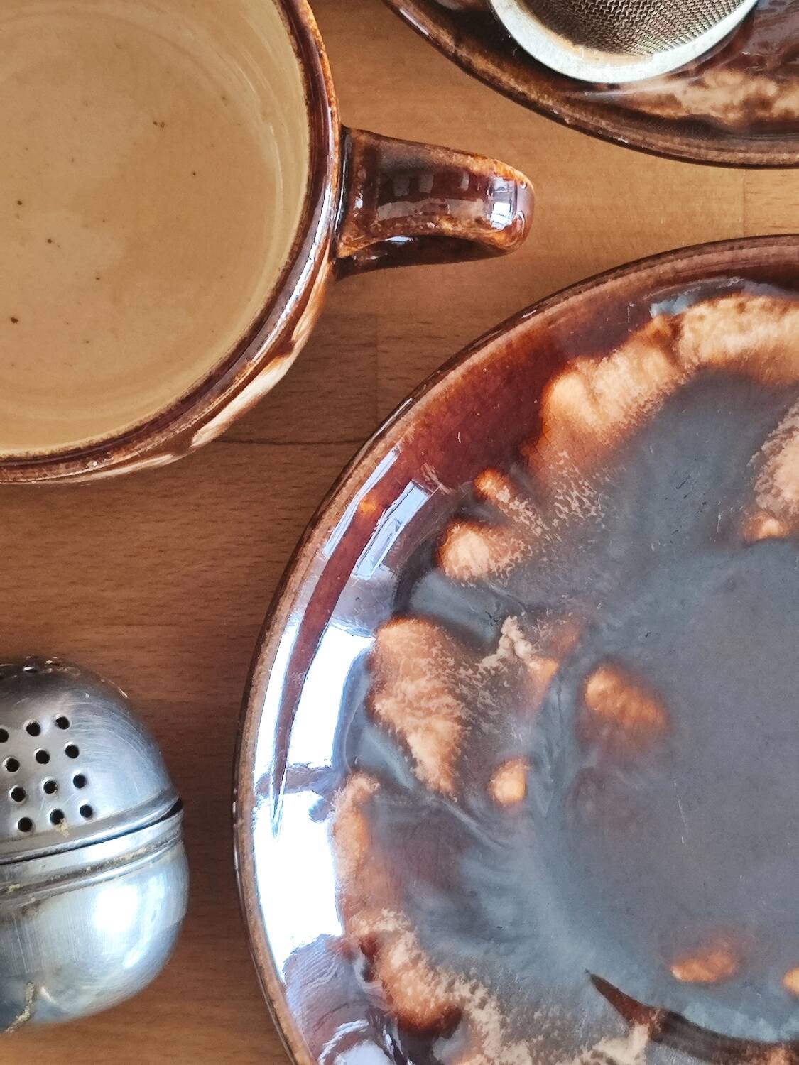 Vintage coffee service in glazed brown ceramic.