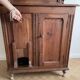 Antique kitchen furniture with built-in coal scuttle.