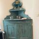 Patinated corner dresser