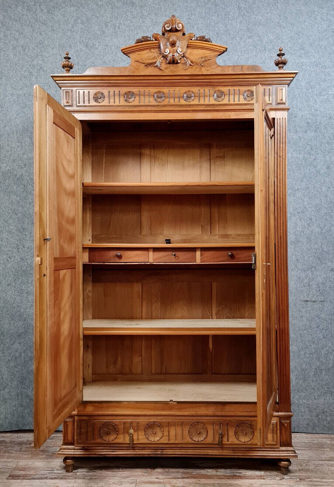 Louis XVI style wardrobe in walnut with blond patina circa 1880