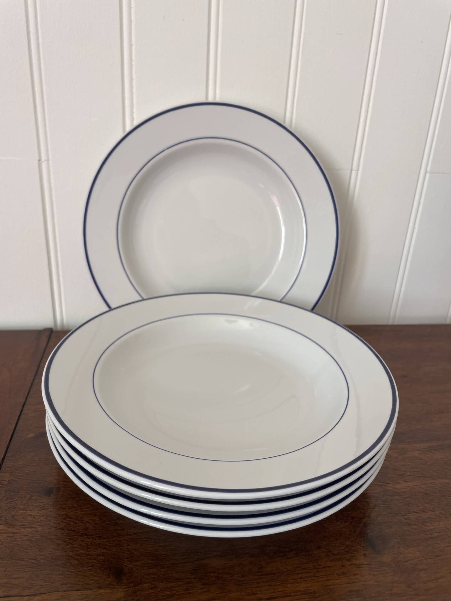 Set of 5 deep porcelain plates from Italy.