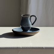 Vintage hand-held candlestick in blue glazed stoneware with floral decoration by Poterie Millian.