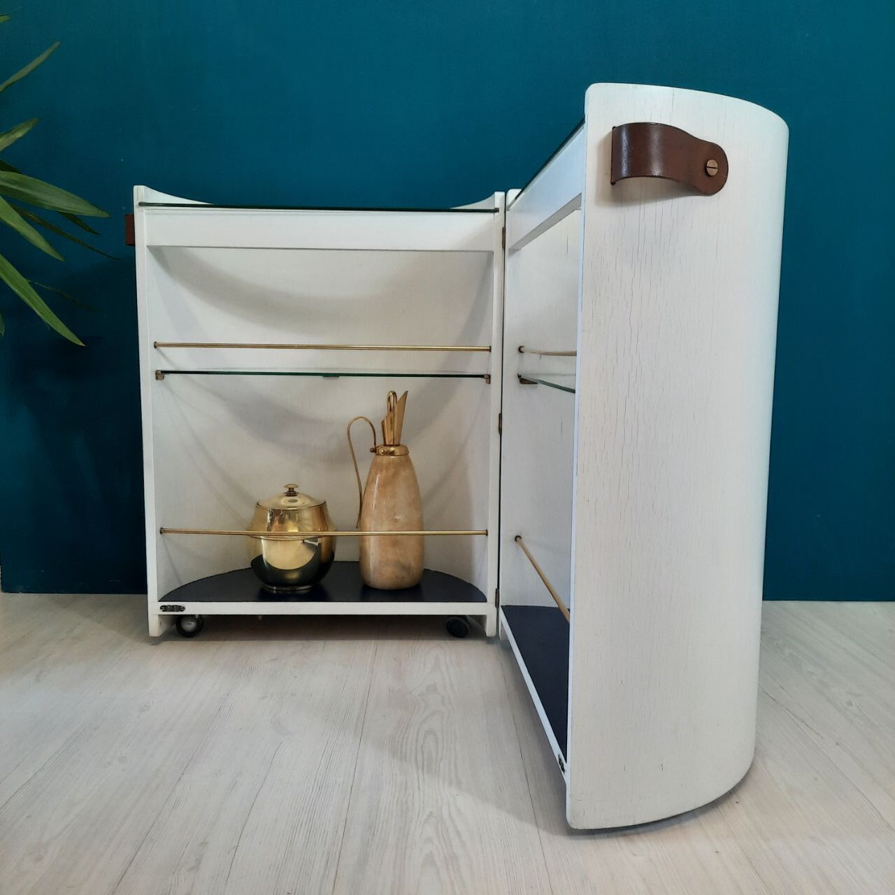 Vintage openable cylinder shaped bar cabinet, wood, brass and glass.