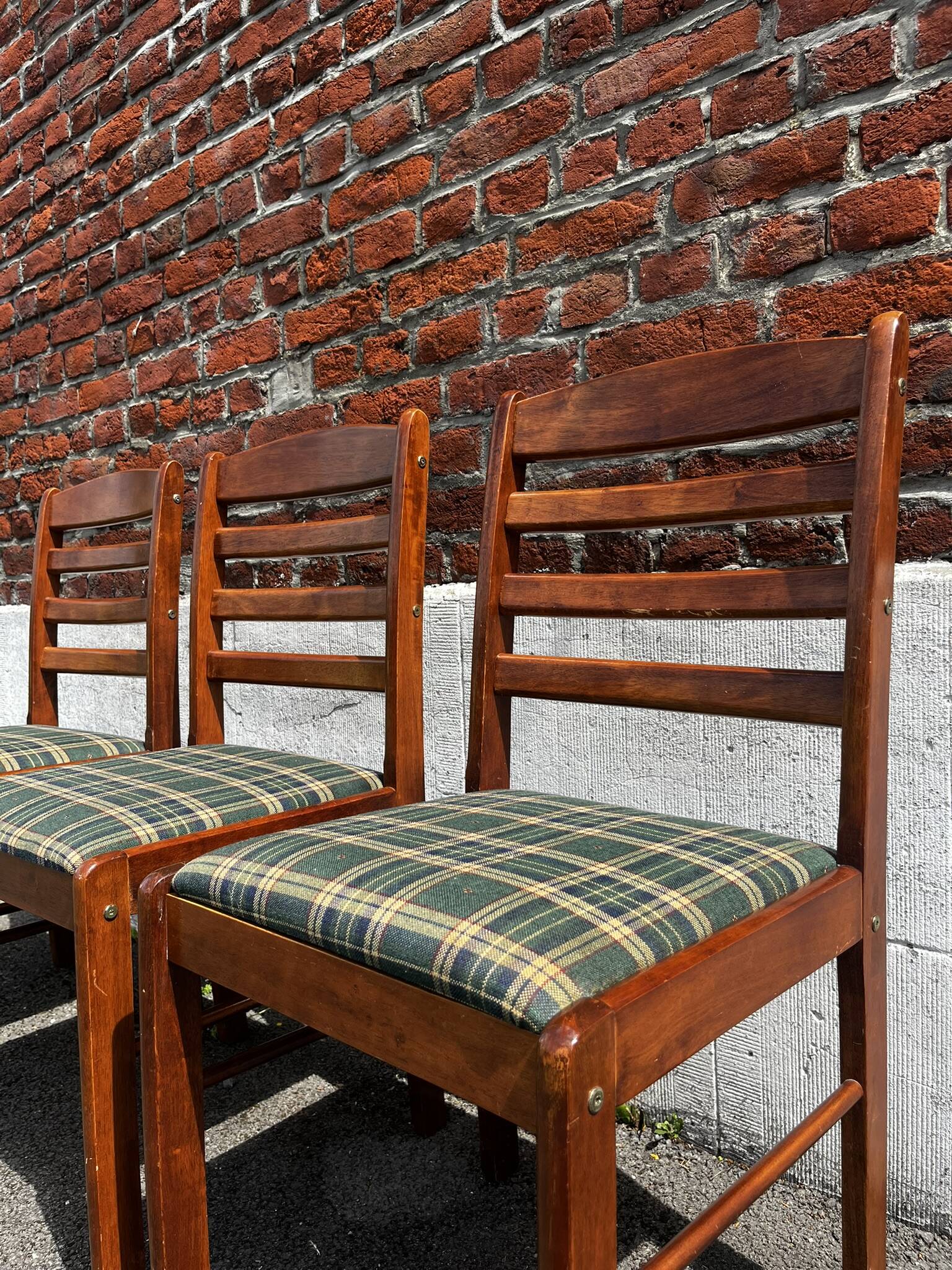Lot of 3 vintage checkered wood and fabric chairs.