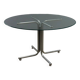 Vintage round table in chrome metal and glass, 1970s.